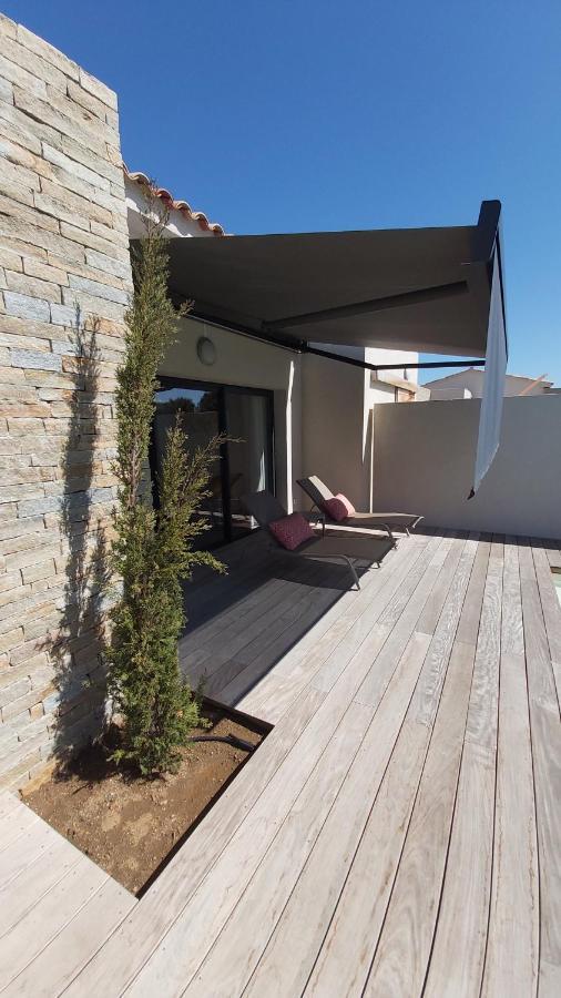 Villa HOME HOLIDAY à Cala Rossa Lecci Extérieur photo