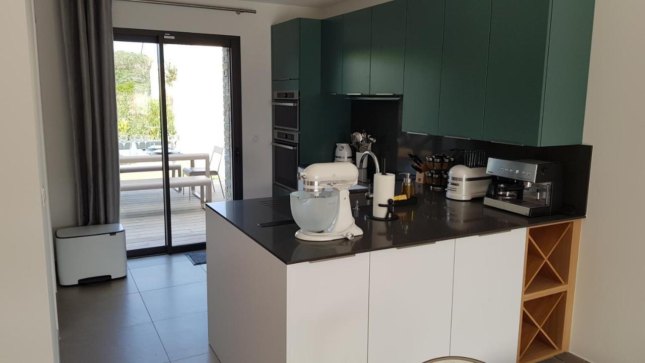 Villa HOME HOLIDAY à Cala Rossa Lecci Extérieur photo