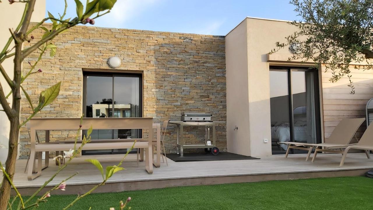 Villa HOME HOLIDAY à Cala Rossa Lecci Extérieur photo