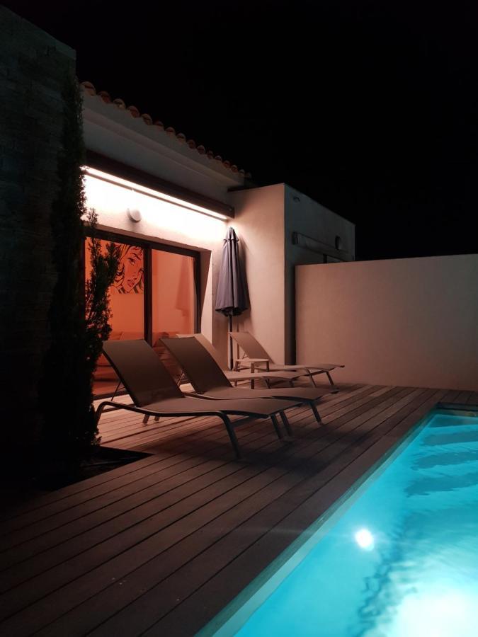 Villa HOME HOLIDAY à Cala Rossa Lecci Extérieur photo