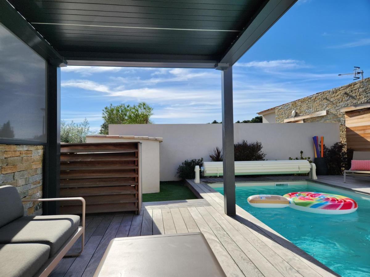 Villa HOME HOLIDAY à Cala Rossa Lecci Extérieur photo
