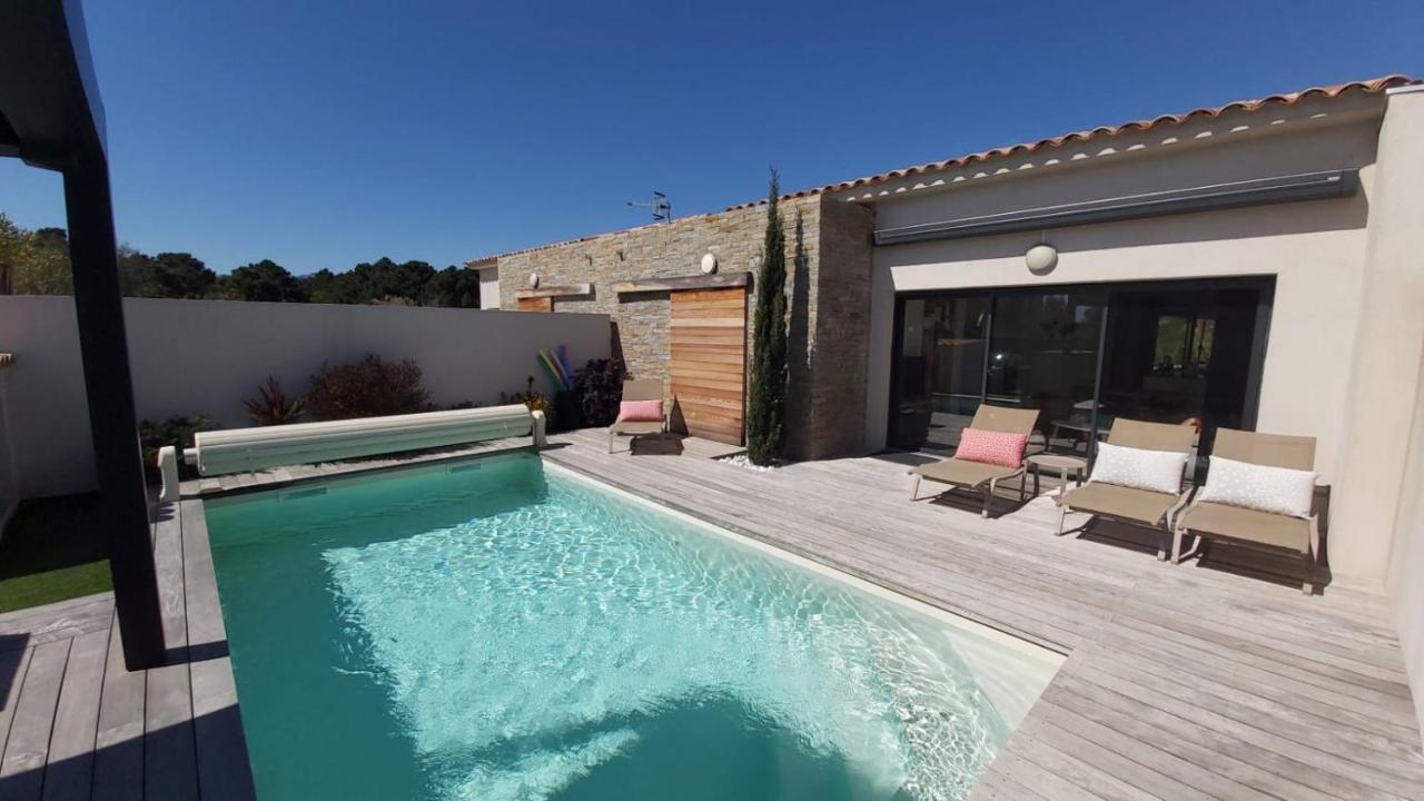 Villa HOME HOLIDAY à Cala Rossa Lecci Extérieur photo
