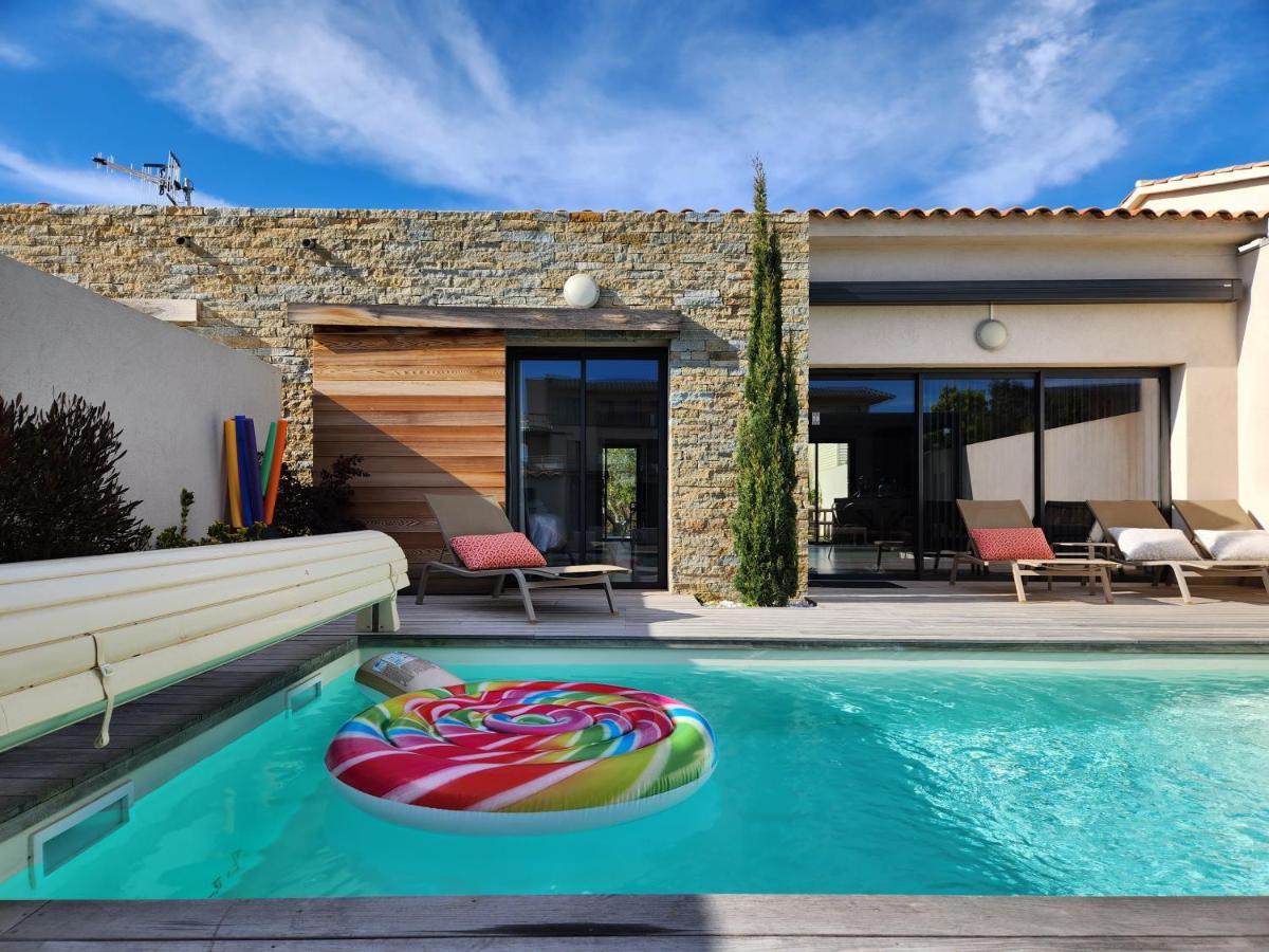 Villa HOME HOLIDAY à Cala Rossa Lecci Extérieur photo