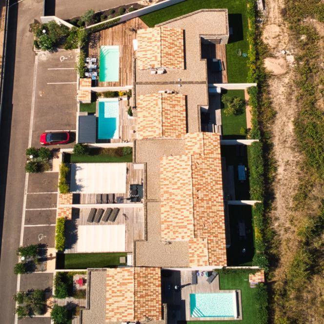 Villa HOME HOLIDAY à Cala Rossa Lecci Extérieur photo